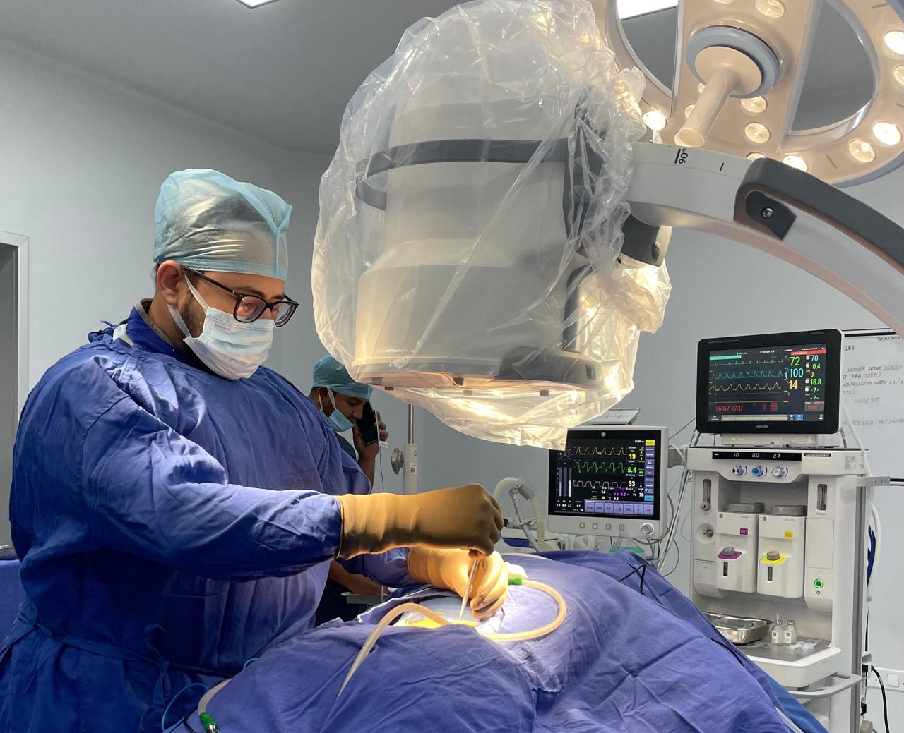 Dr. Pushkar Ranade performing a neurosurgical procedure in theatre
